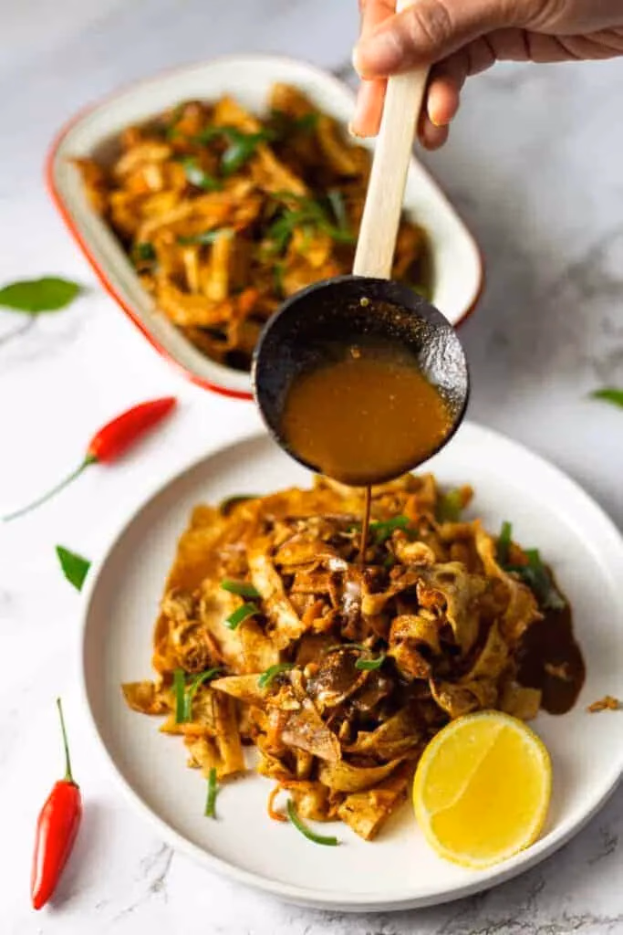 K1 Villa - Serene outdoor dining experience under the Sri Lankan sky.